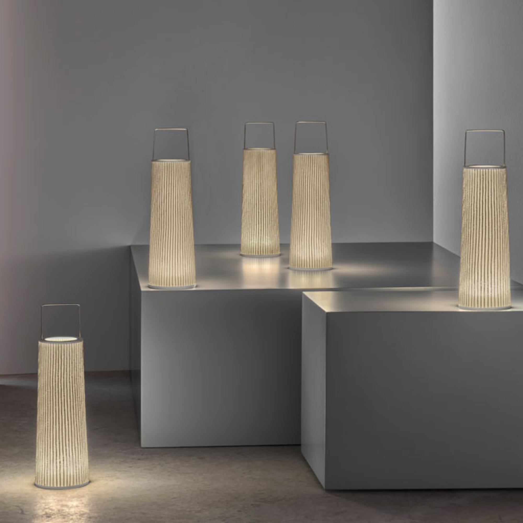 The Hipatia Cordless Lamp from a-emotional light in a studio.