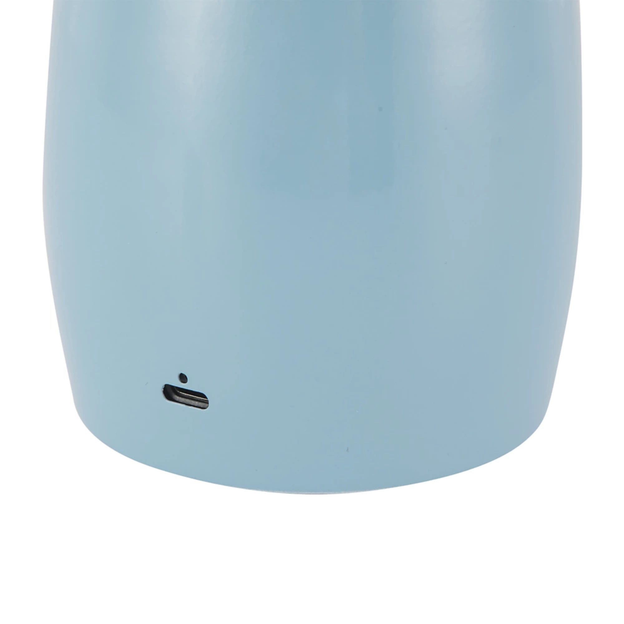 The cerulean Poppy Cordless Lamp from Alora Mood charging port.