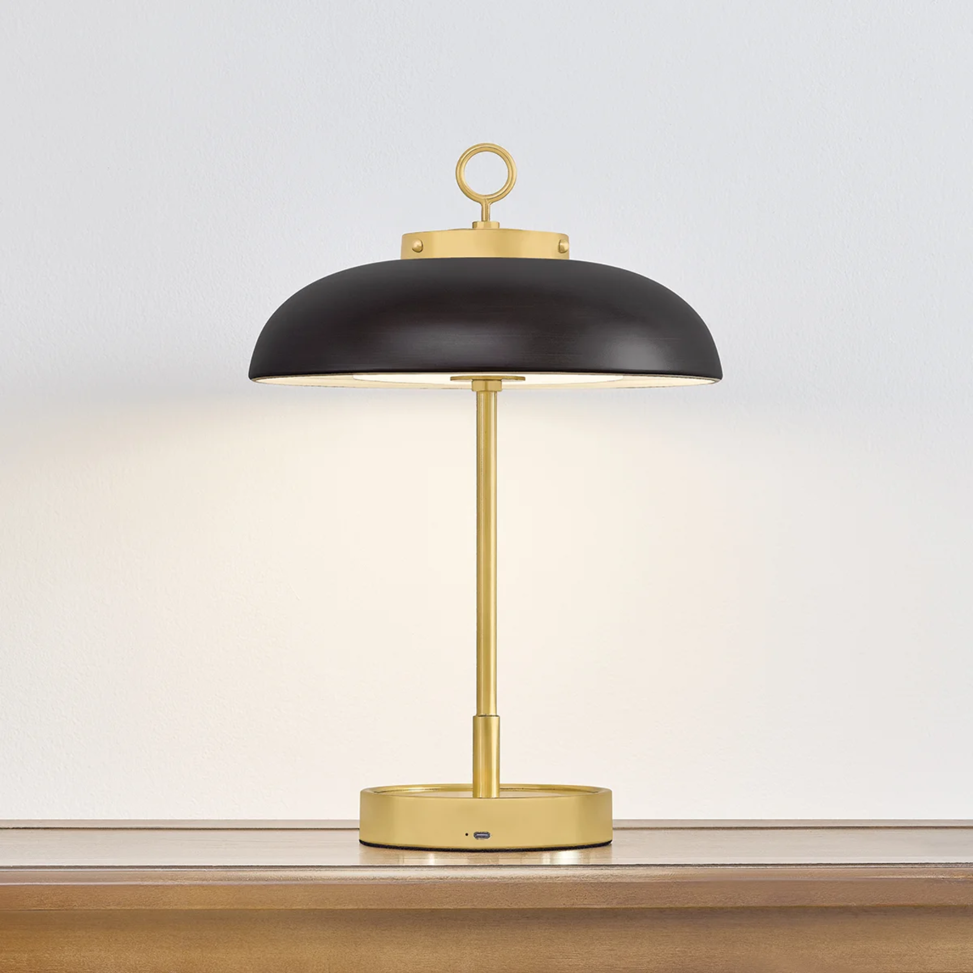 The Hector Cordless Table Lamp from Hudson Valley Lighting in a living room.