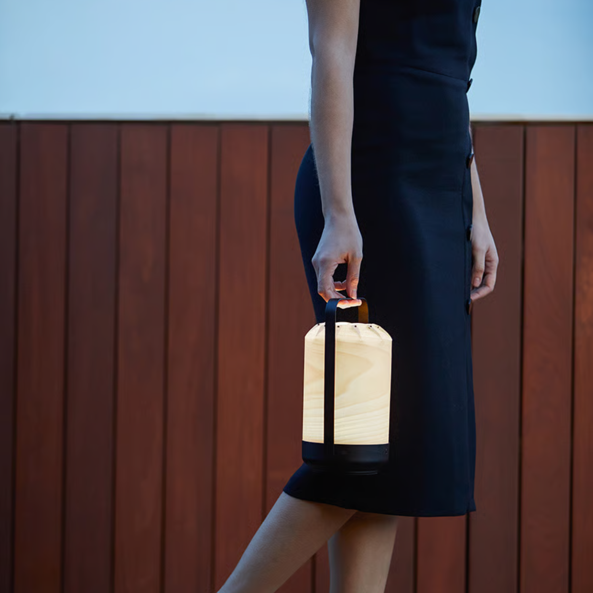 The Mini Chou Cordless Table Lamp from LZF in a living room. all-groups