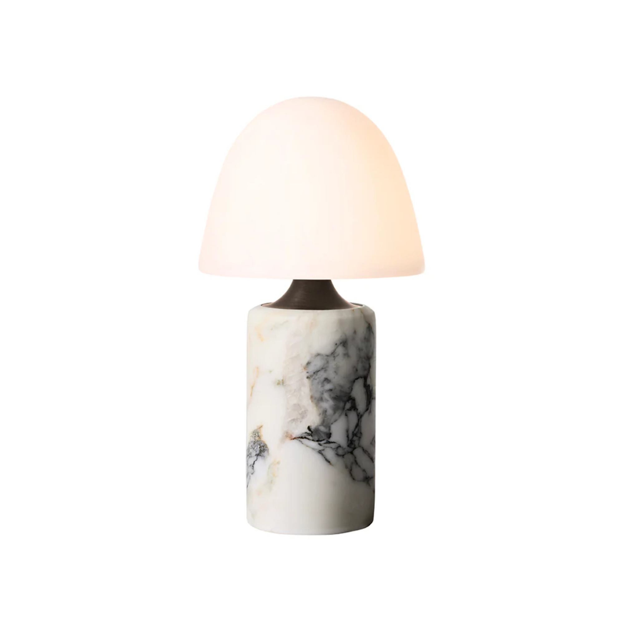 The Fuse Cordless Lamp from Made by Hand turned on.