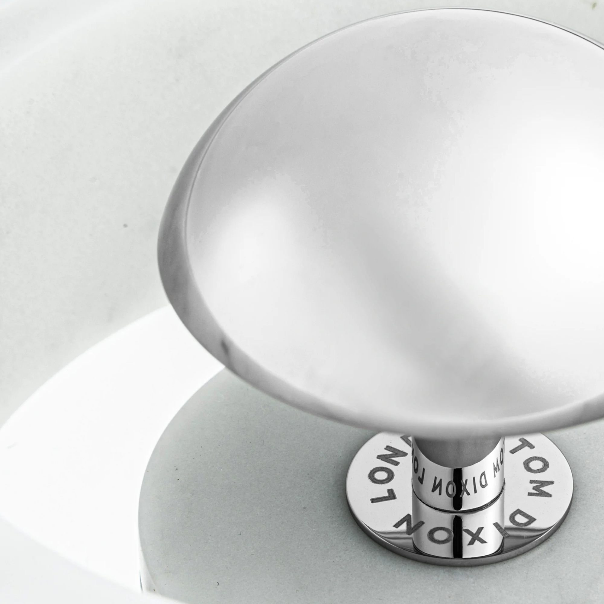 The silver Stone Cordless Lamp from Tom Dixon shown close up.
