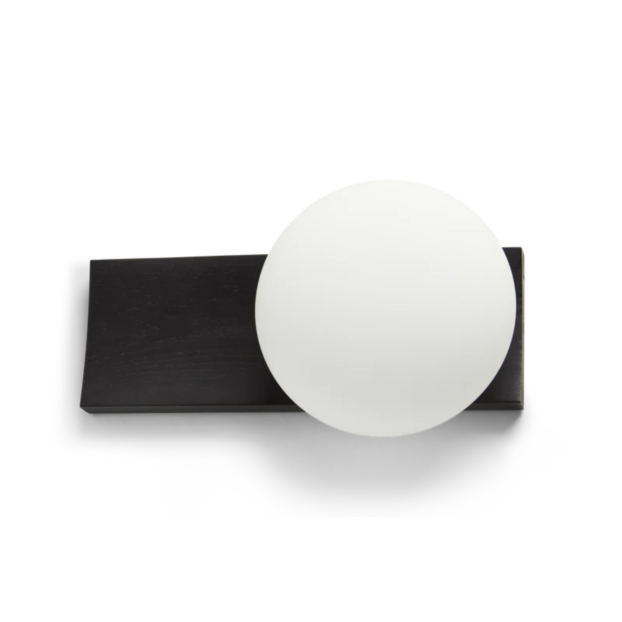 The black painted ash Dew Cordless Table Lamp & Wall Sconce from Woud from a top view.
