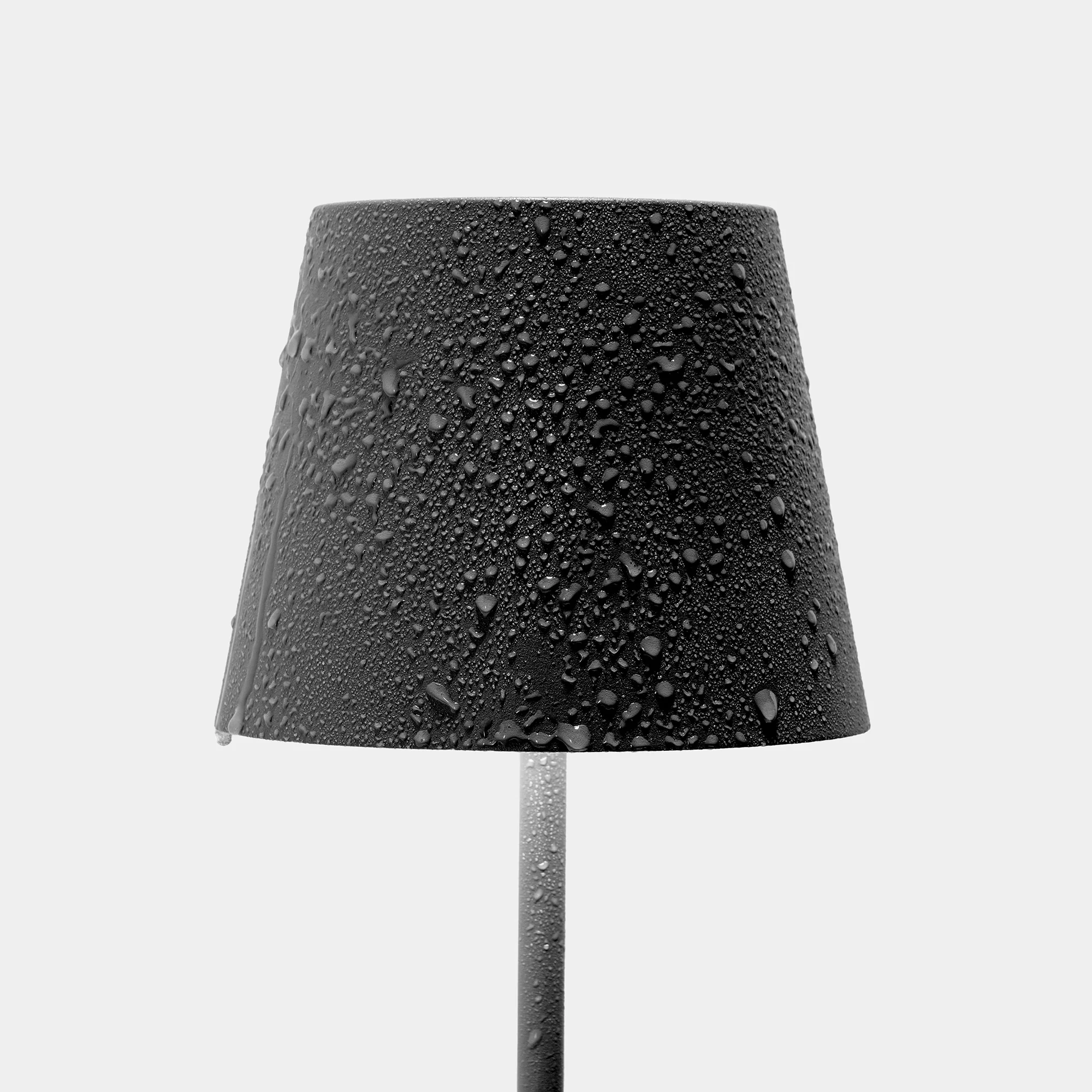 The dark gray Poldina Pro from Zafferano showing it's waterproof properties.