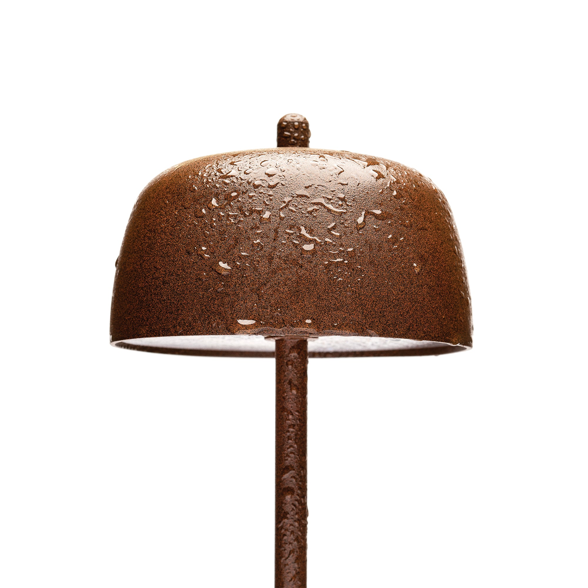 The rust Theta Pro Cordless Lamp from Zafferano showing its waterproof features and IP65 rating.