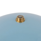 The cerulean Poppy Cordless Lamp from Alora Mood on and off switch.