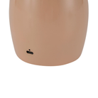 The peach Poppy Cordless Lamp from Alora Mood charging port.