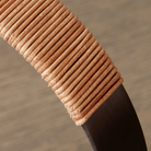 The bronzed brass Carrie Portable Table Lamp from Audo Copenhagen showing the handle close up.