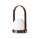 The bronzed brass Carrie Portable Table Lamp from Audo Copenhagen.