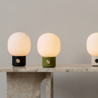 The black, dusty green and alabaster white JWDA Portable Table Lamp from Audo Copenhagen. all-groups