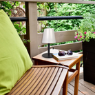 The Tinsley Cordless Table Lamp from Dainolite in an outdoor living space.