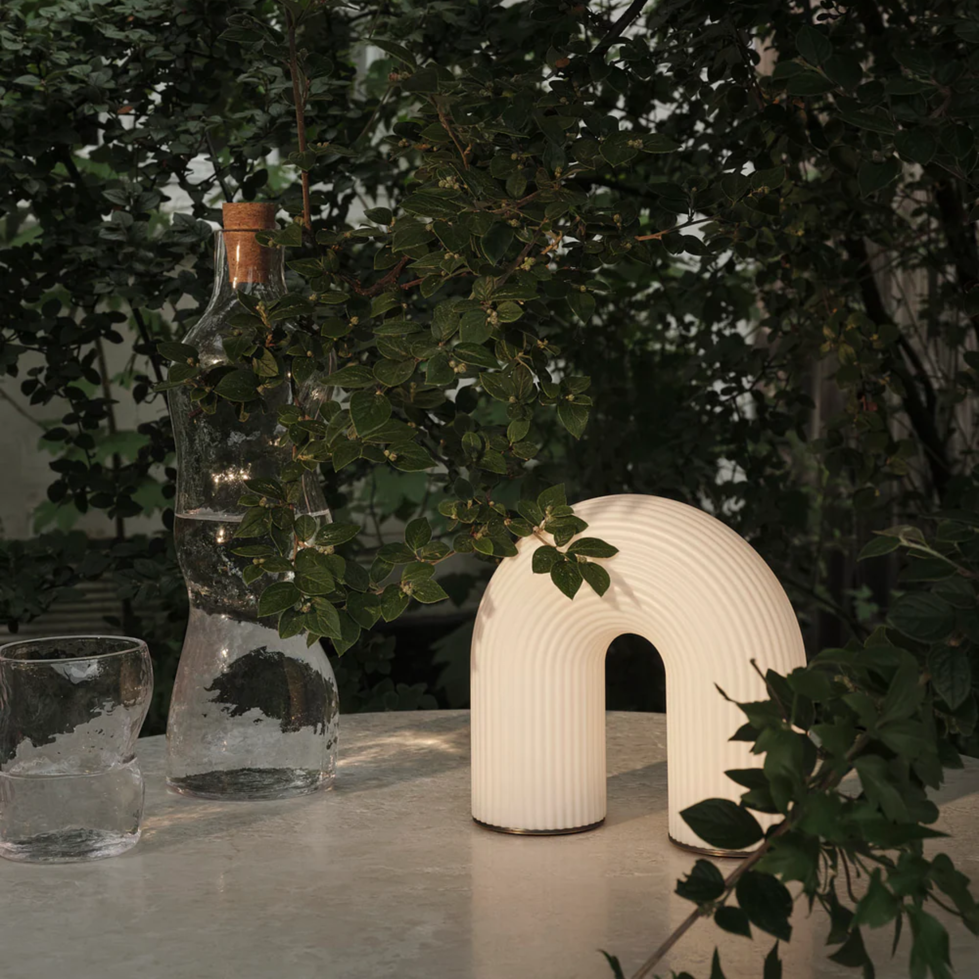 The Vuelta Portable Lamp from ferm LIVING in a family area.