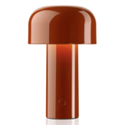 The burnt orange Bellhop Cordless Lamp from FLOS.