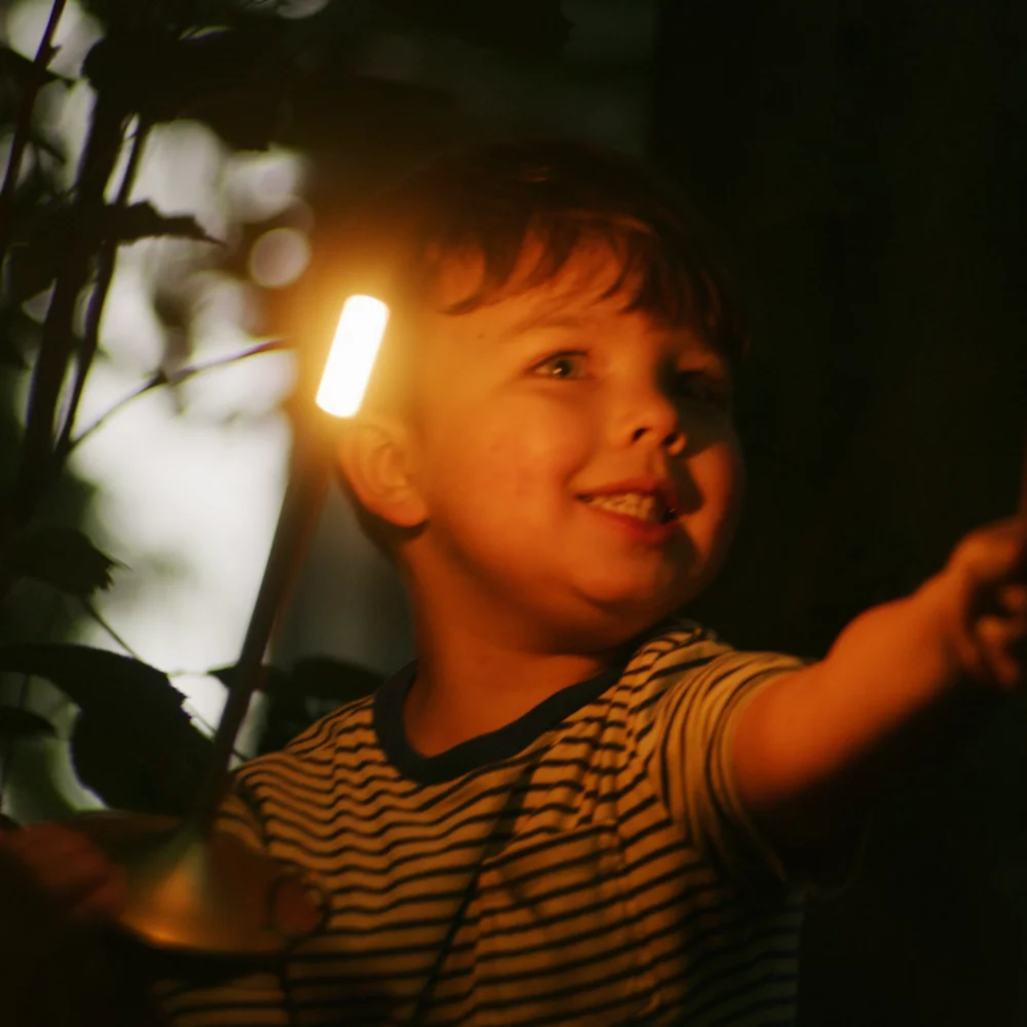 The brass Wick Cordless Lamp from Graypants used as home lighting.
