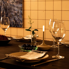 The Wick Pro Cordless Lamp from Graypants used at home on a dining table.