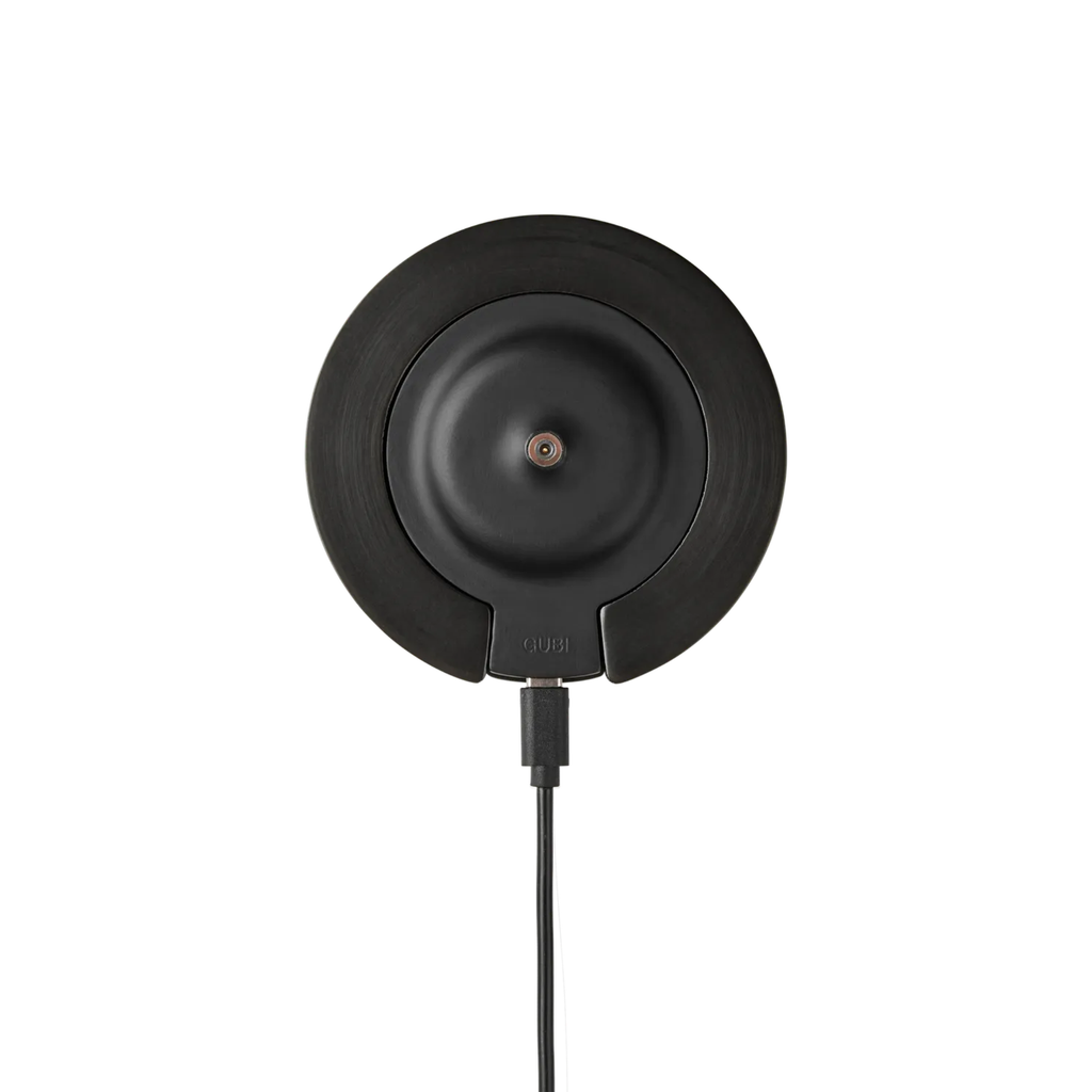 The Seine Portable Table Lamp from GUBI charging base.