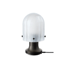 The Seine Portable Table Lamp from GUBI showing the charging cord.