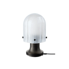 The Seine Portable Table Lamp from GUBI showing the charging cord.