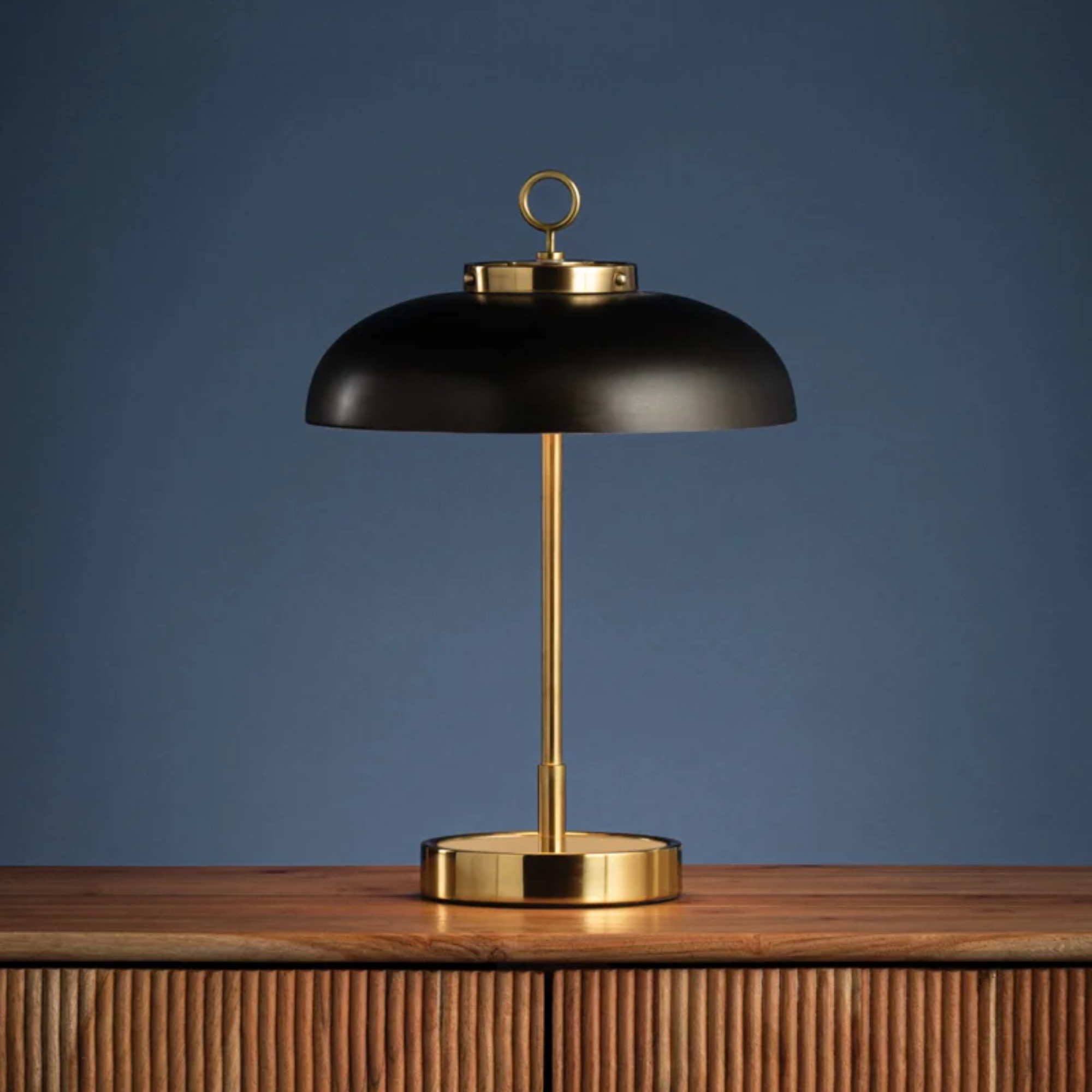 The Hector Cordless Table Lamp from Hudson Valley Lighting in a family area.