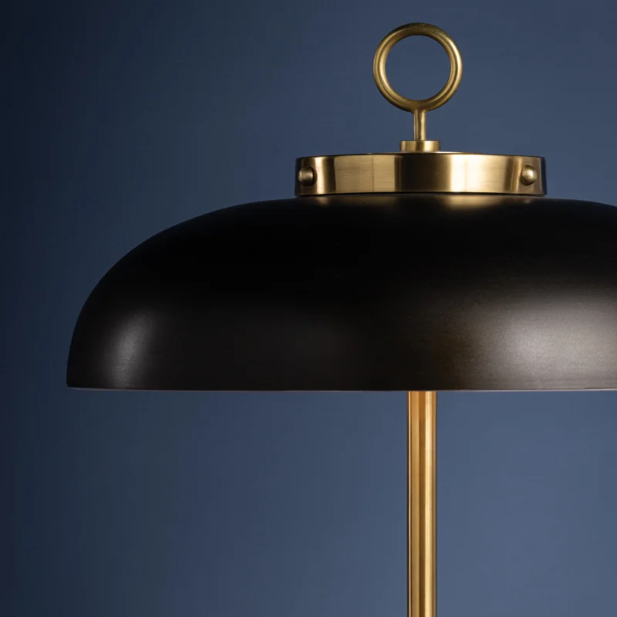 The Hector Cordless Table Lamp from Hudson Valley Lighting in a home office.
