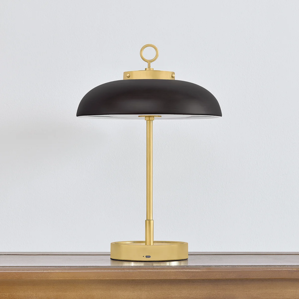 The Hector Cordless Table Lamp from Hudson Valley Lighting in a living space.