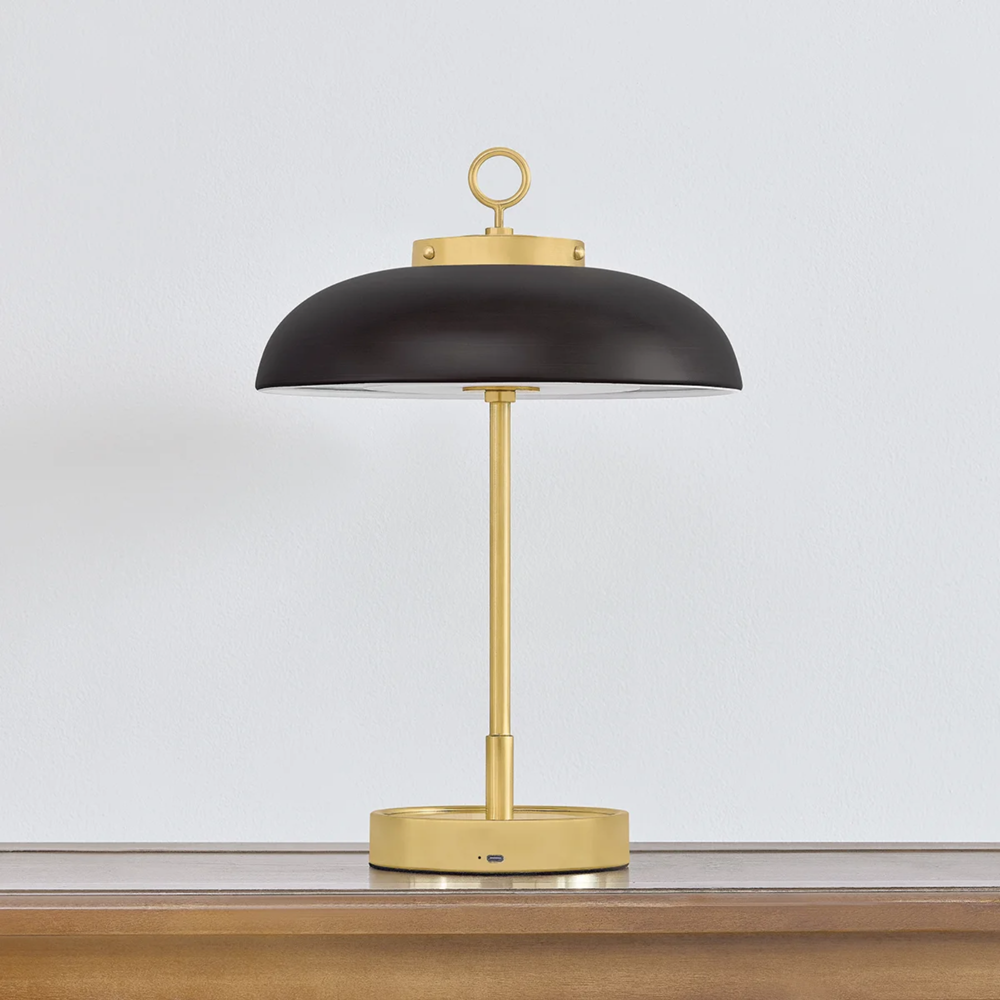 The Hector Cordless Table Lamp from Hudson Valley Lighting in a living space.