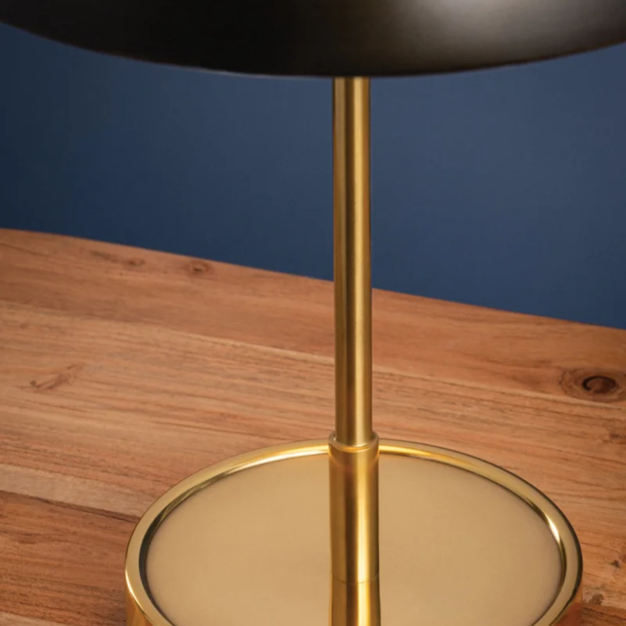 The Hector Cordless Table Lamp from Hudson Valley Lighting in a lounge.