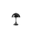 The black Panthella 160 Portable Lamp from Louis Poulsen turned on.