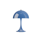 The opaque indigo Panthella 250 Portable Lamp from Louis Poulsen turned on.