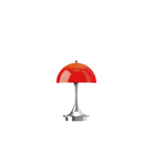 The 9.5 inch red Panthella Portable Lamp: The Originals from Louis Poulsen turned on.