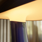 The night blue Rumee 220 Portable Lamp from Louis Poulsen LED close up.