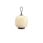 The pale yellow VL45 Radiohus Table Lamp from Louis Poulsen turned off.