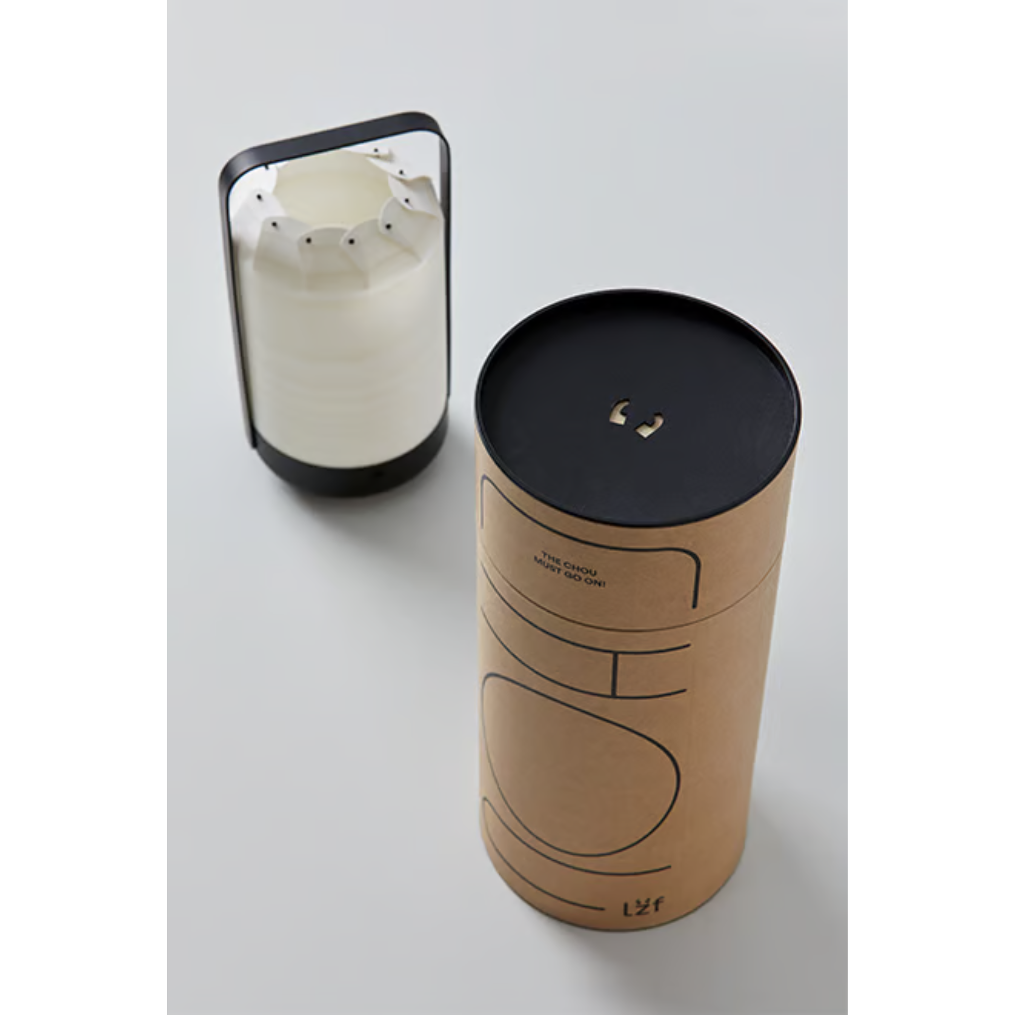 The Mini Chou Cordless Table Lamp from LZF packaging. all-groups