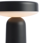 The black Ease Cordless Lamp from Muuto close up. all-groups