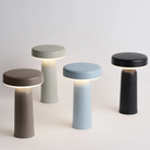All four colors of the Ease Cordless Lamp from Muuto in a studio.