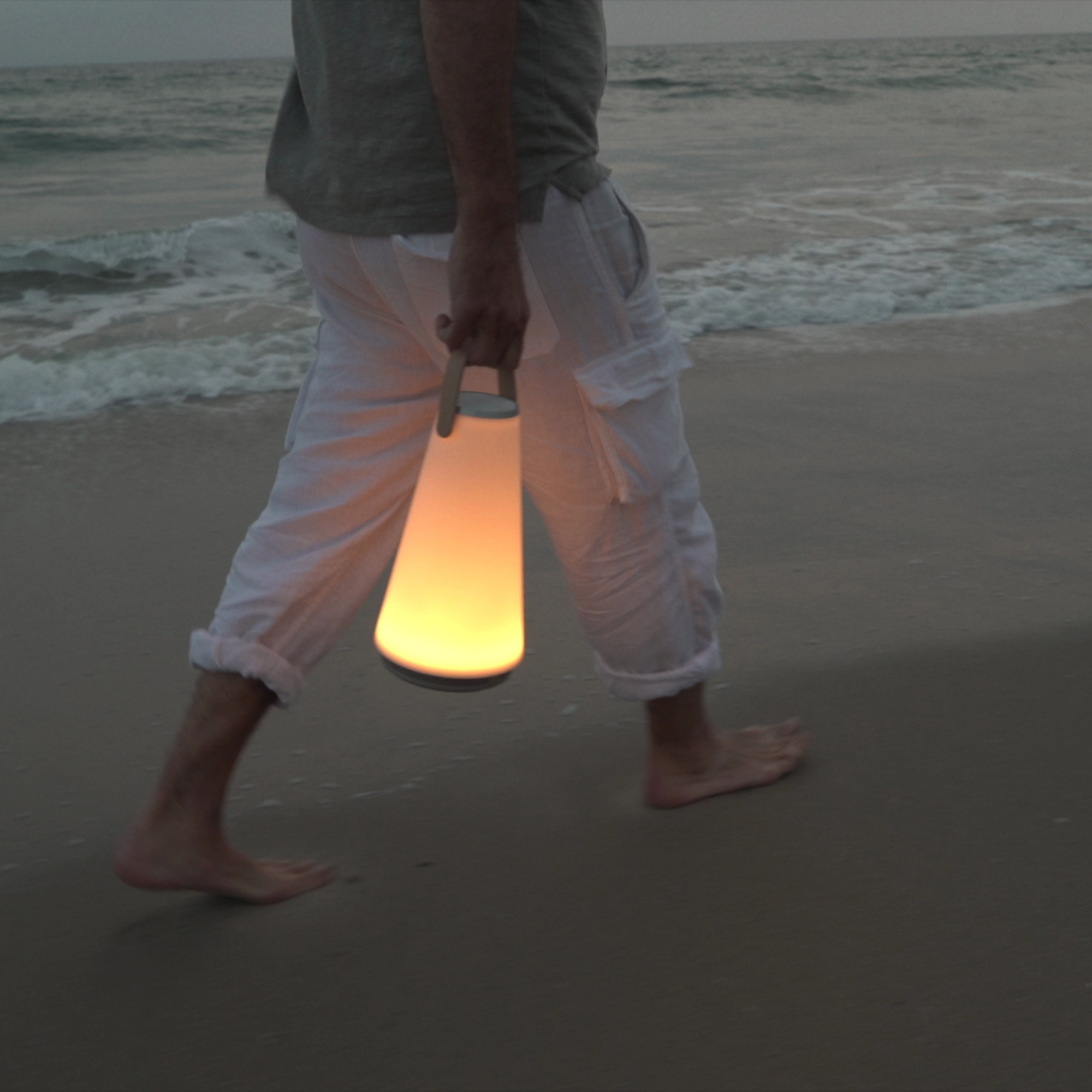 The Uma Sound Table Lamp from Pablo Designs used for a walk on the beach.