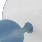 The baby blue Bell Cordless Lamp from Tom Dixon close up.