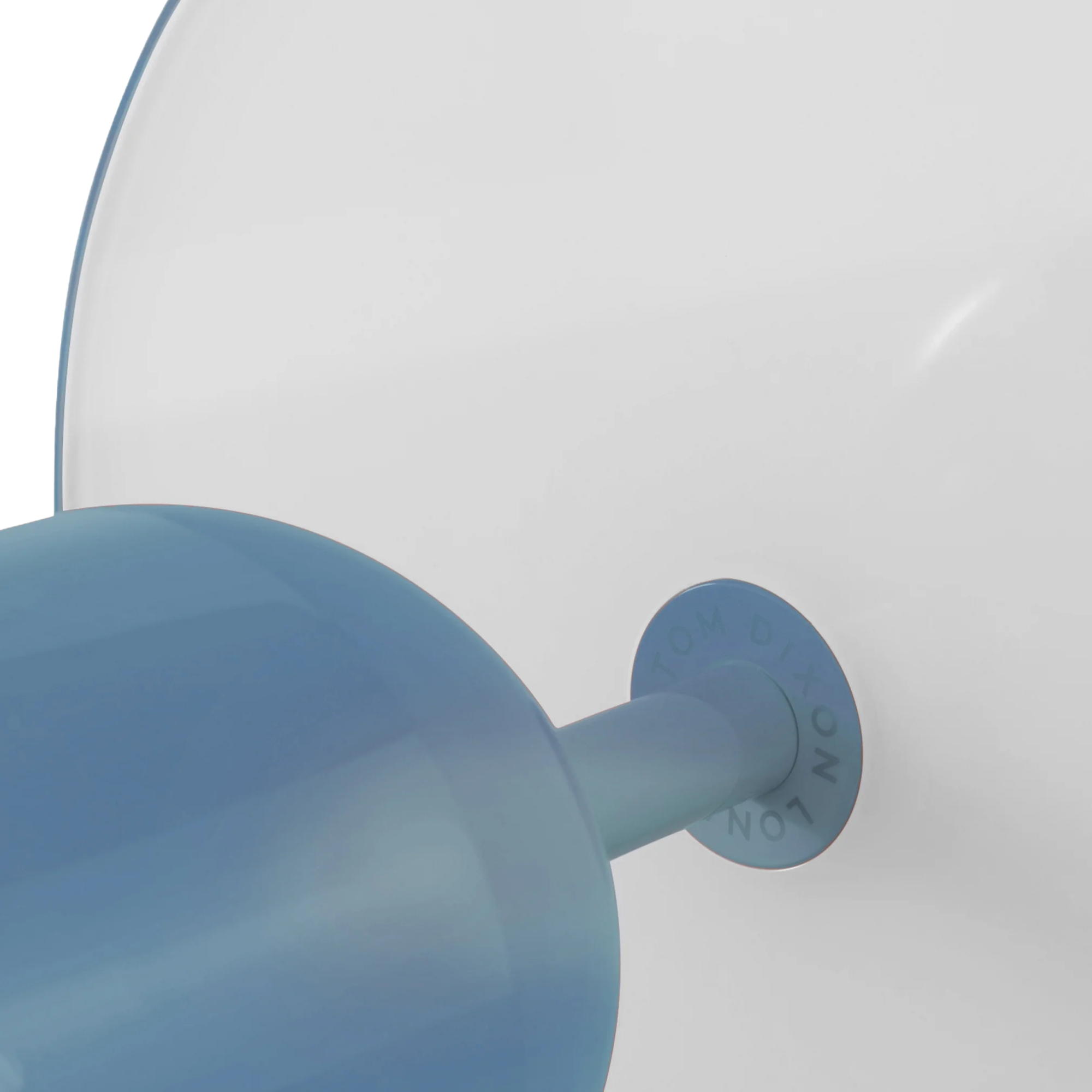 The baby blue Bell Cordless Lamp from Tom Dixon close up.