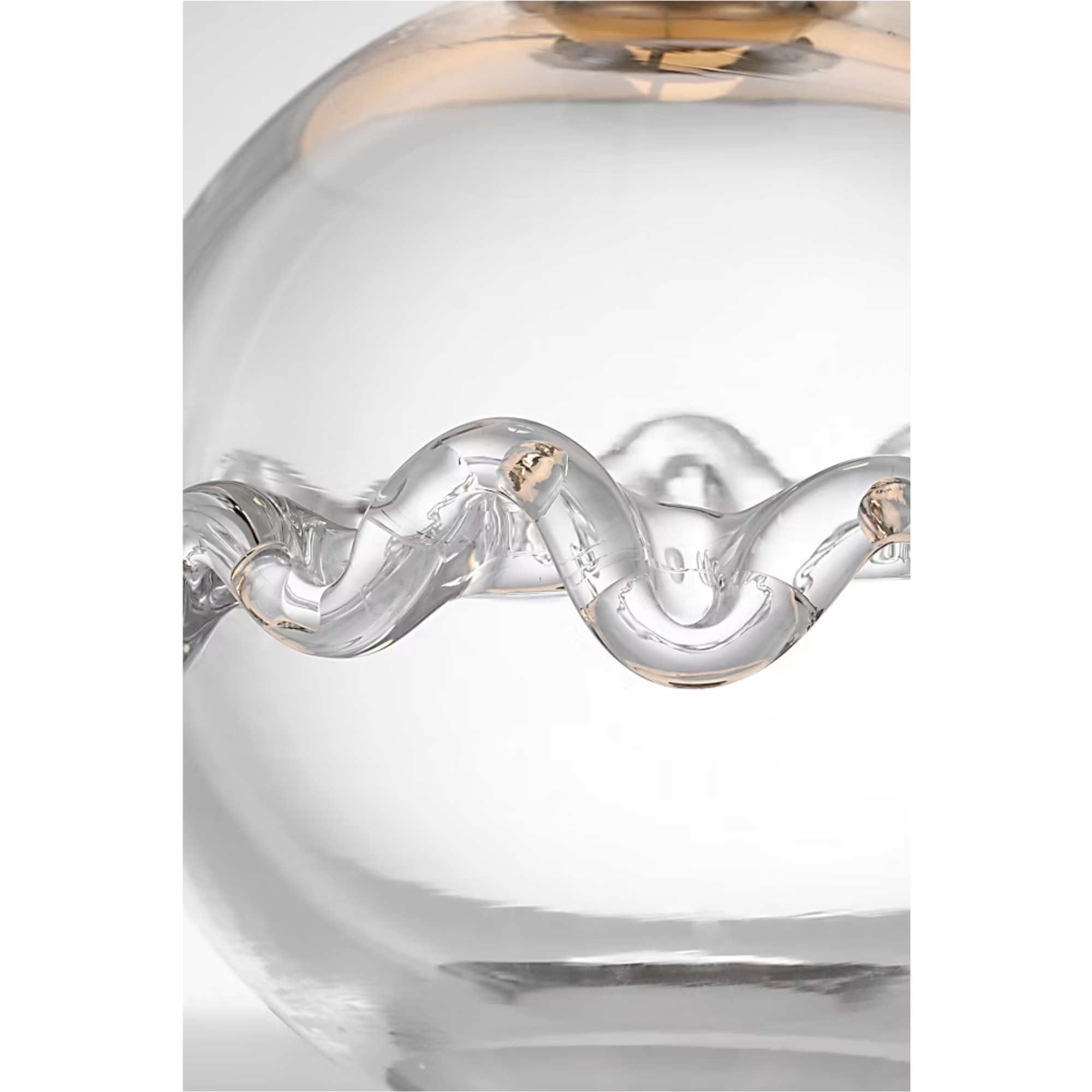 The Breslin Cordless Lamp from Visual Comfort Signature focusing on the design of the glass base and body.