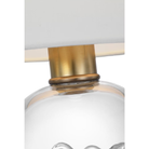 The Breslin Cordless Lamp from Visual Comfort Signature showing the glass body and linen shade.