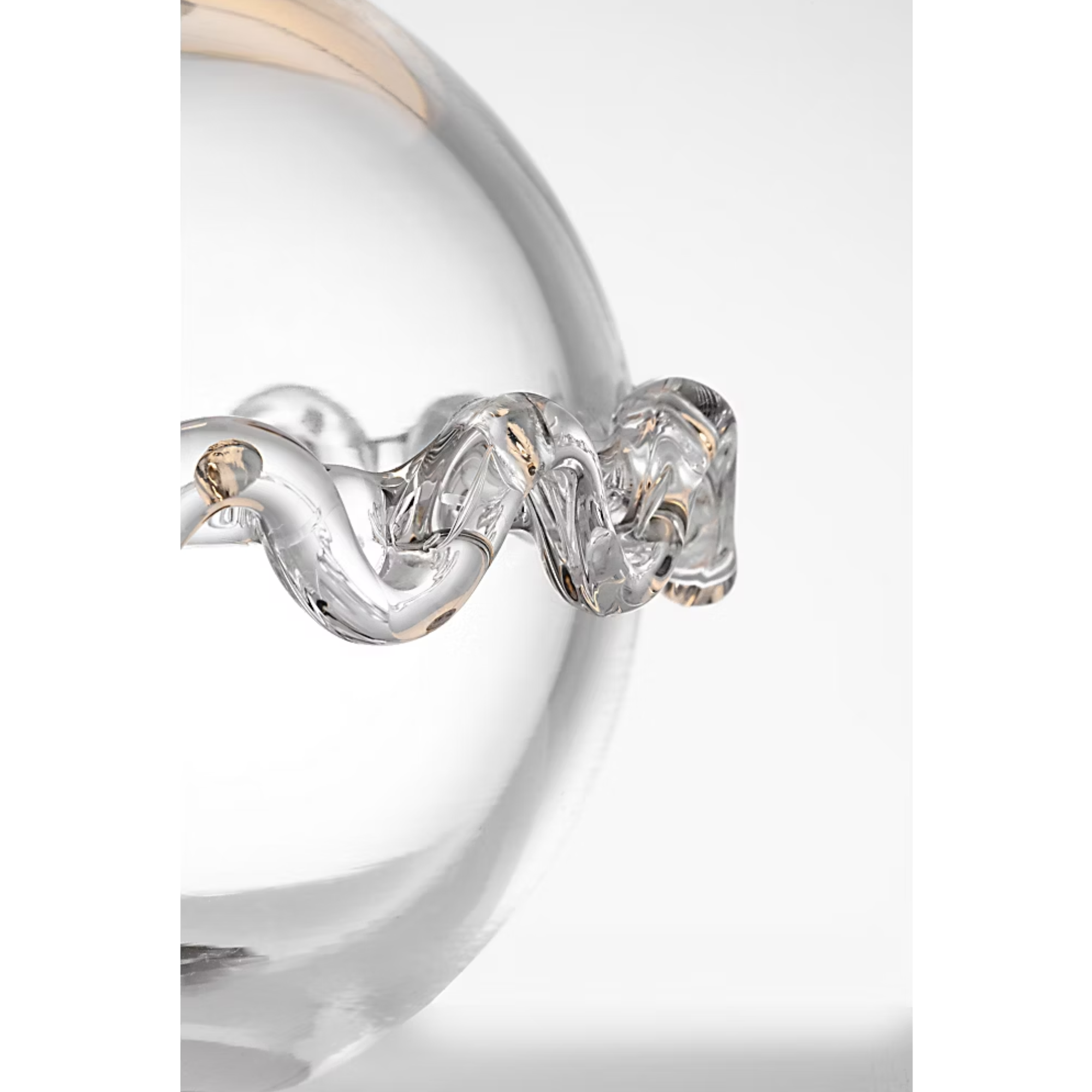 The Breslin Cordless Lamp from Visual Comfort Signature in a studio showing the glass base close up.