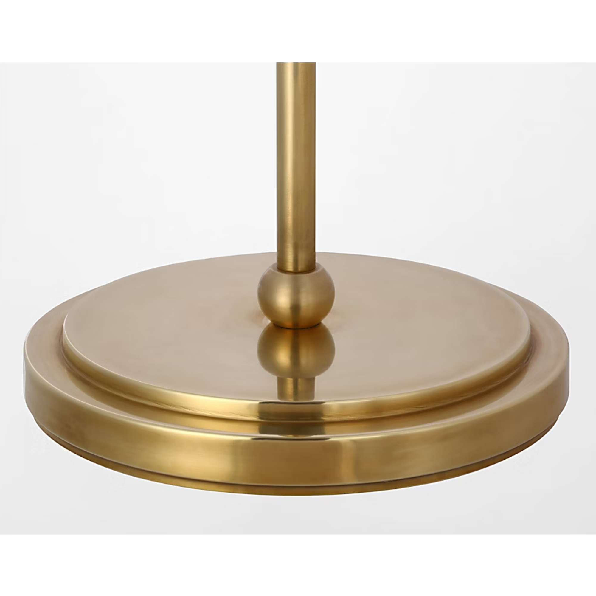 The brass Bryant Adjustable Cordless Floor Lamp base.