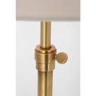 The brass Bryant Adjustable Cordless Floor Lamp post.