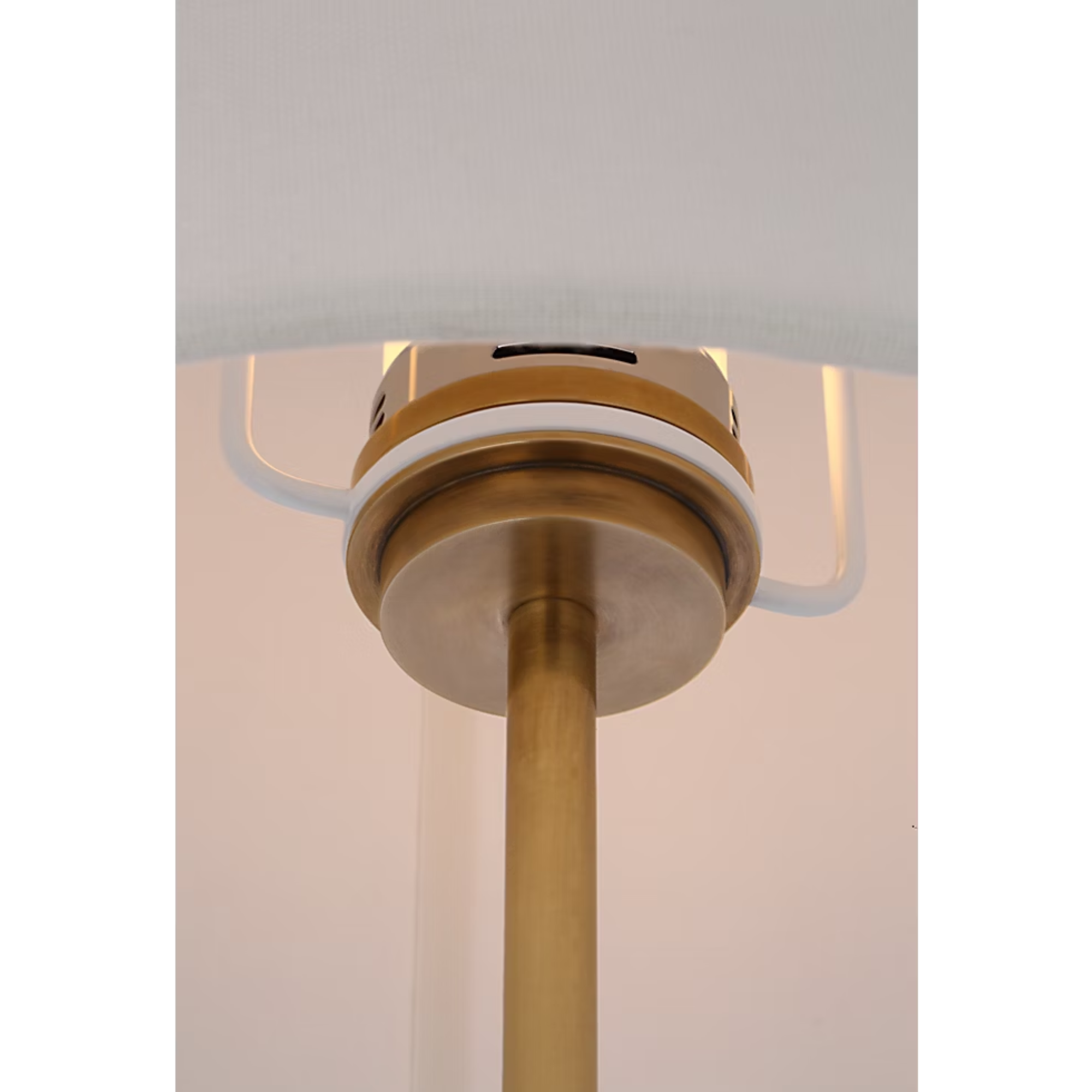 The brass Bryant Adjustable Cordless Floor Lamp shade and post close up.