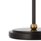 The bronze and hand rubbed antique brass Bryant Adjustable Cordless Floor Lamp base.