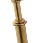 The brass Carthage Cordless Lamp from Visual Comfort Signature focusing on the adjustable height knob and post.