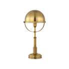 The brass Carthage Cordless Lamp from Visual Comfort Signature shown at an angle.