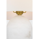 The Folly Rotatable Cordless Table Lamp from Visual Comfort Signature focusing on the alabaster body and linen shade.