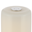 The nickel R41 Rechargeable Module Cordless Lamp from Visual Comfort Signature, shown in a close-up of the cylindrical lamp diffuser in a warm off-white color, featuring a small circular metallic silver button on top, set against a plain white background. 