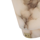 The Tourne 12" Cordless Lamp from Visual Comfort Signature showing the direct charging port and on/off switch close up.